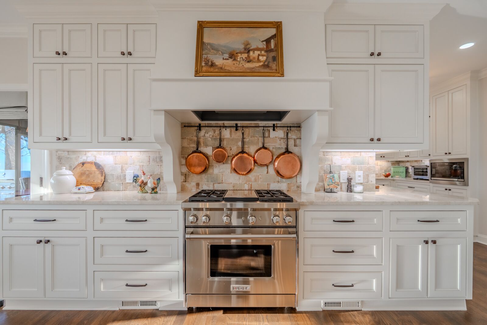 Kitchen with Wolf gas range and Taj Mahal quartzite
